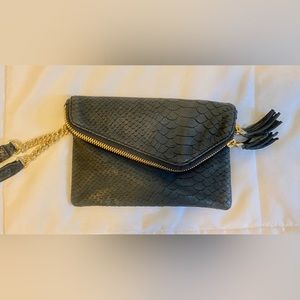 Never used leather clutch